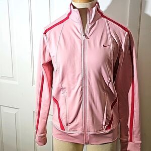 Nike athletic zipper jacket. Pink size medium (8-10) zipper pockets.  Very‎ good